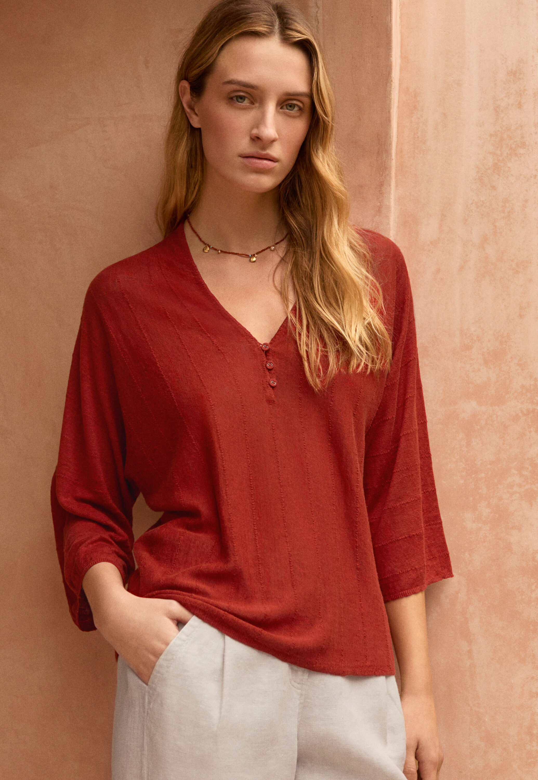 V-neck buttoned sweater