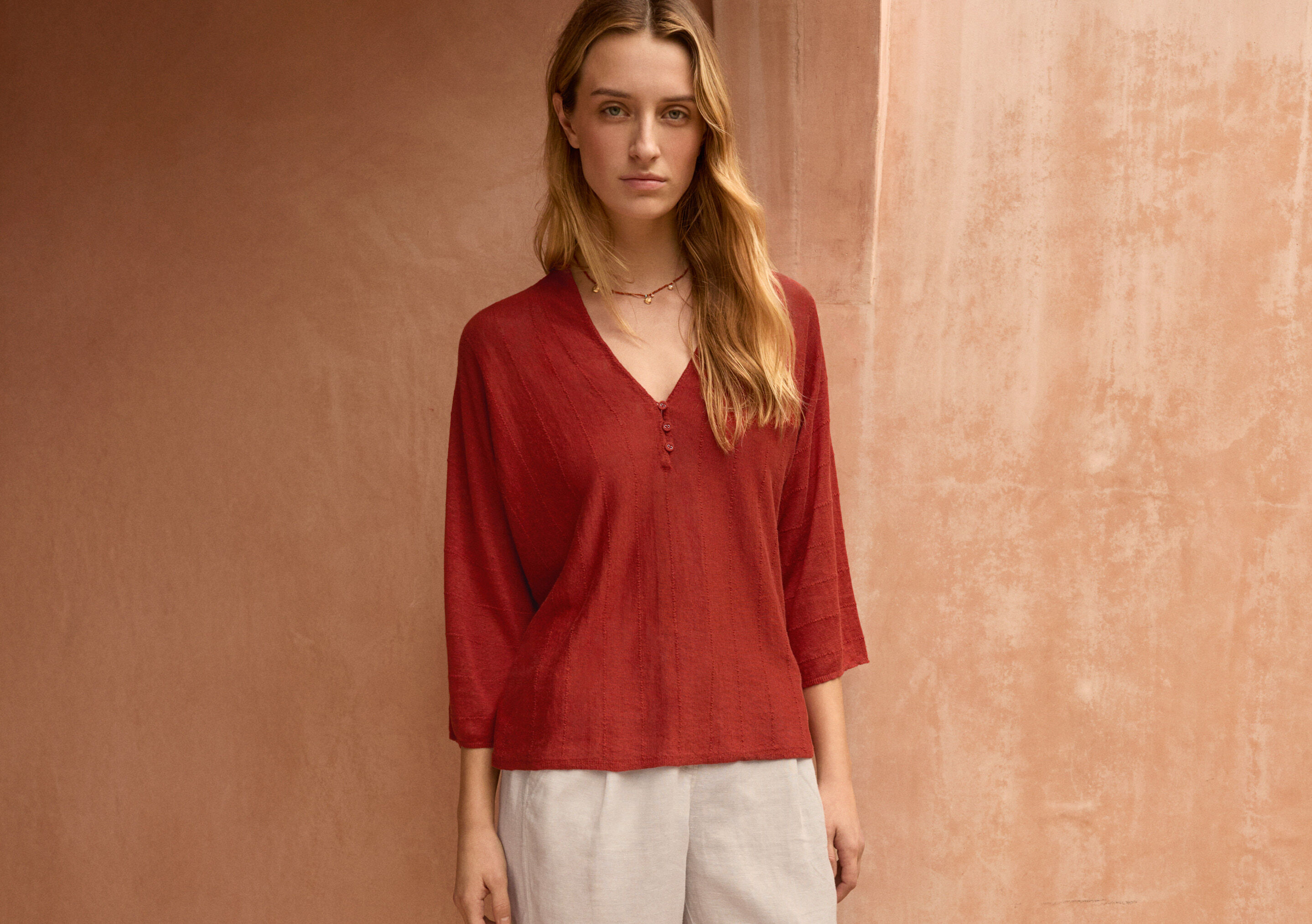 V-neck buttoned sweater