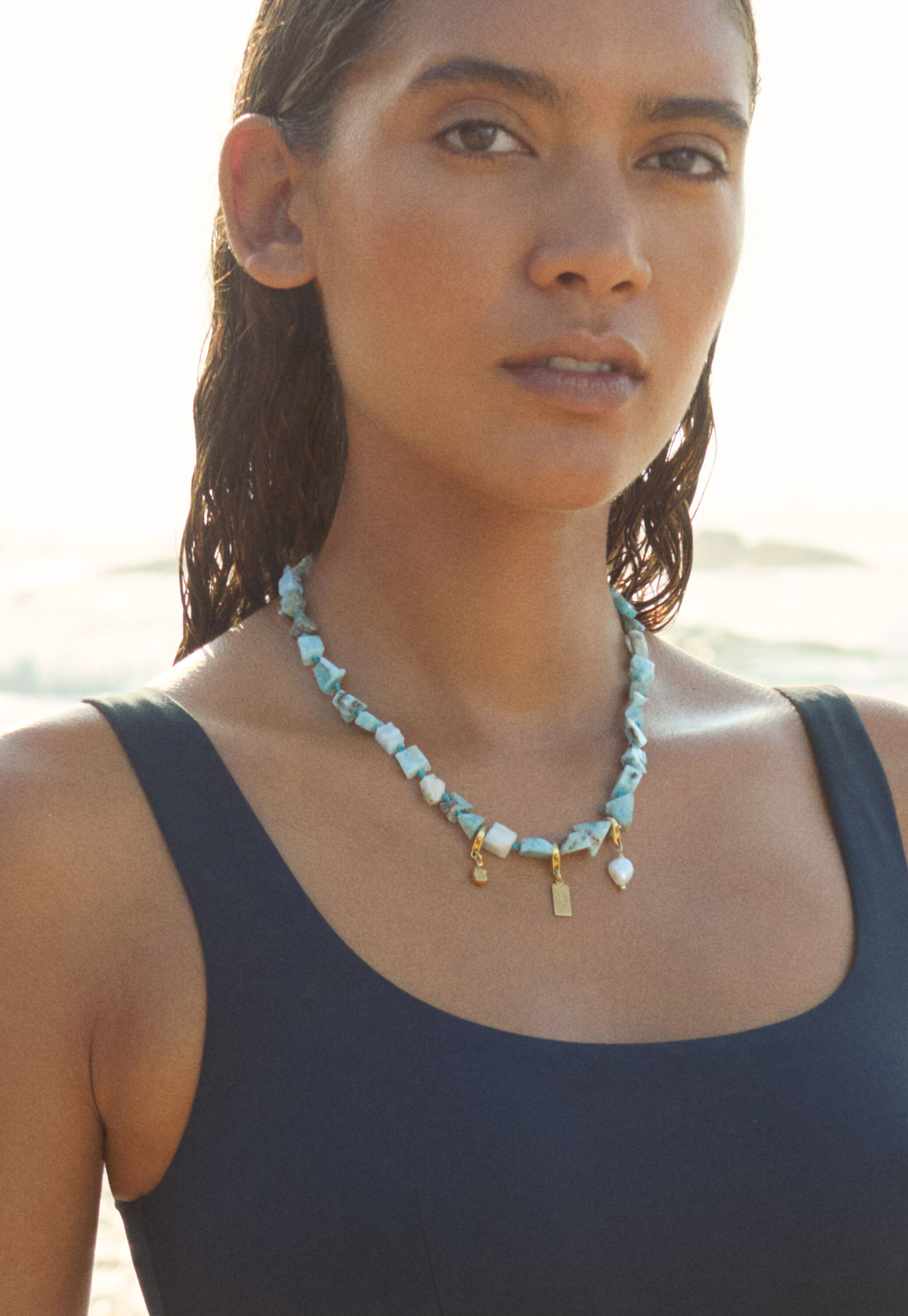 Stone and charm necklace
