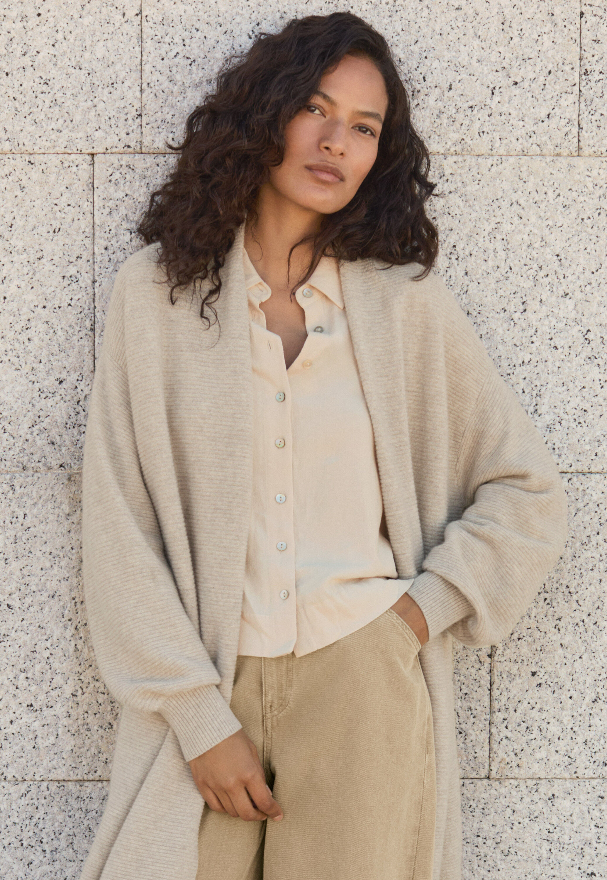 Curved-sleeve blouse