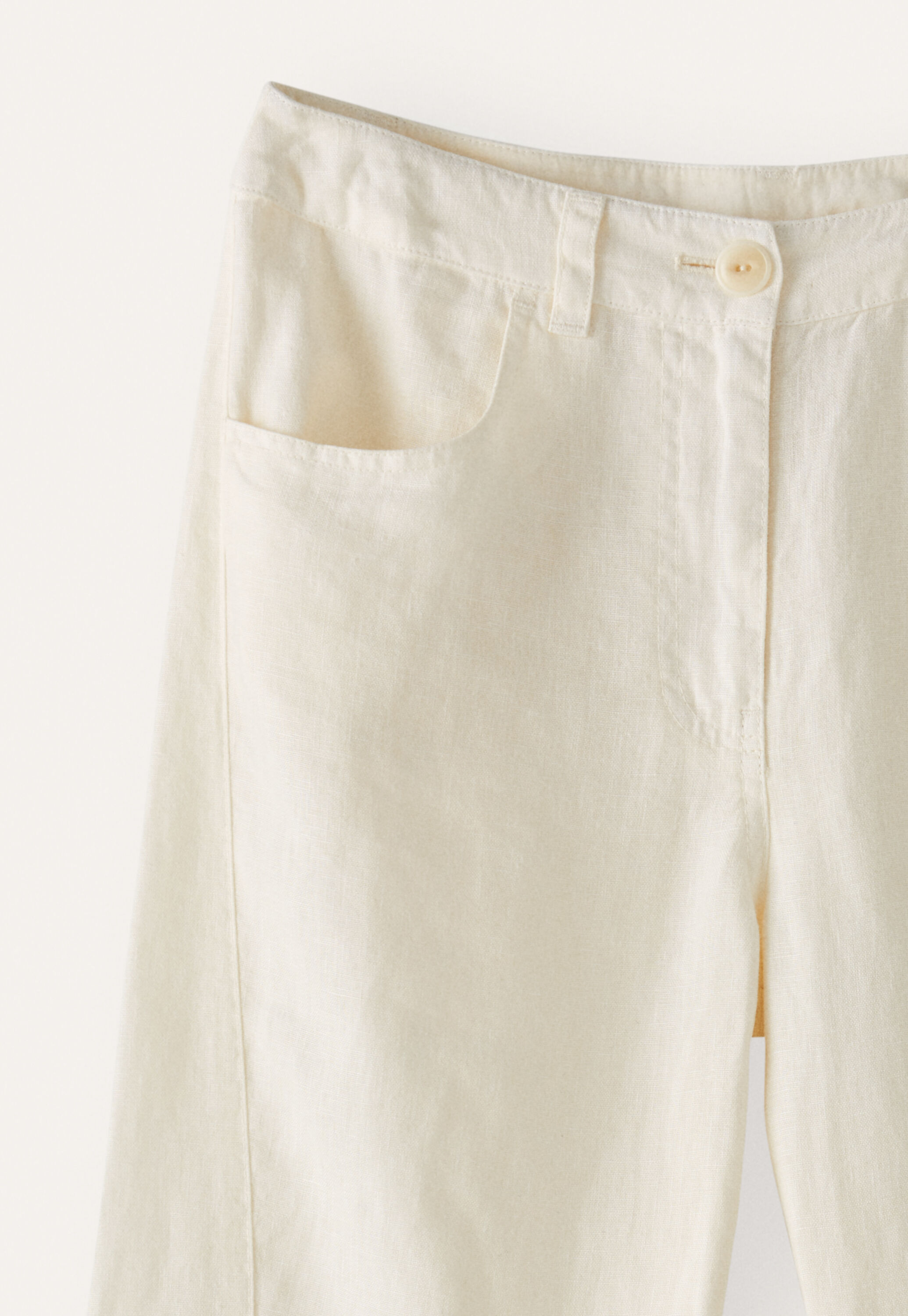 Curved-leg trousers