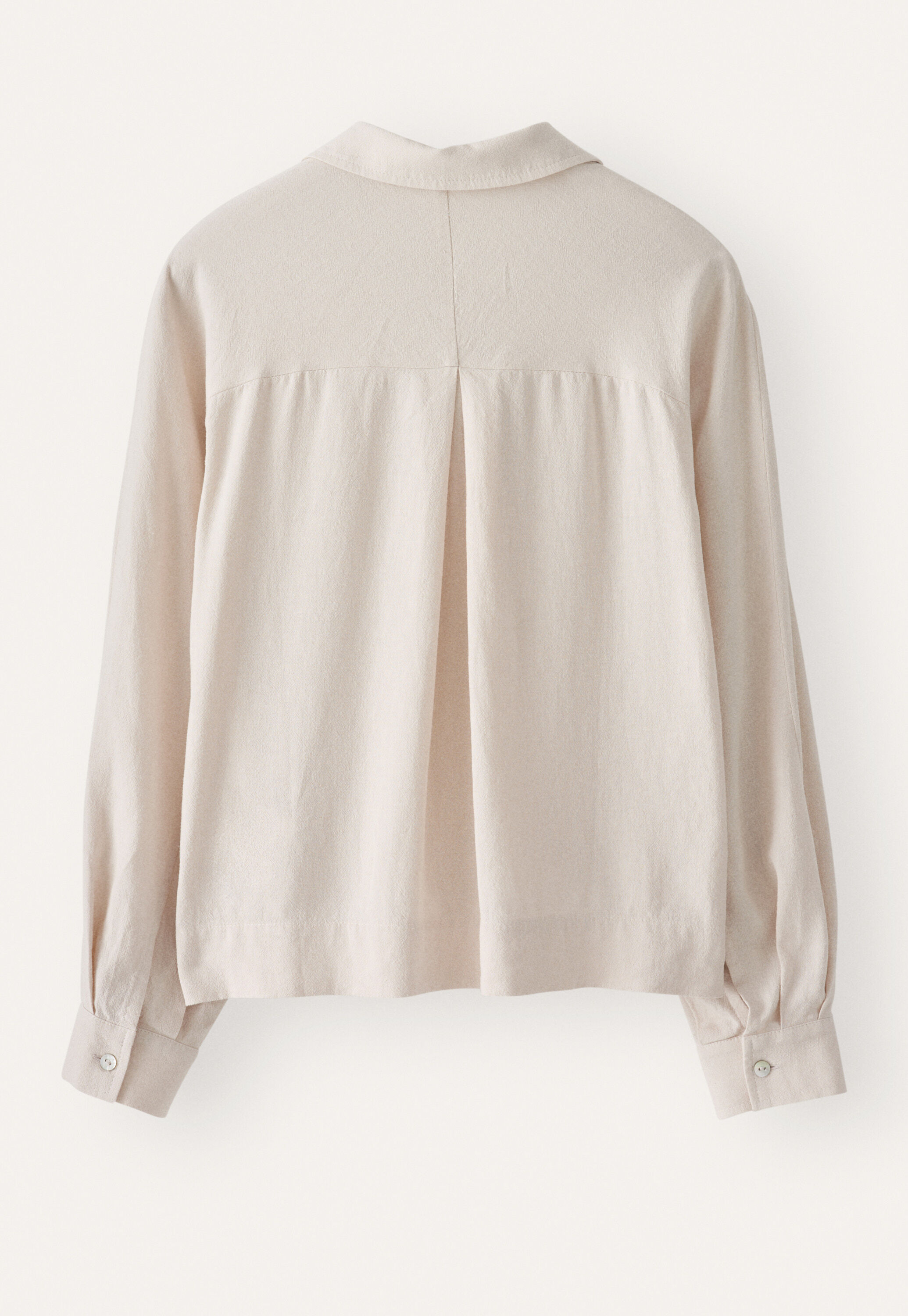 Curved-sleeve blouse