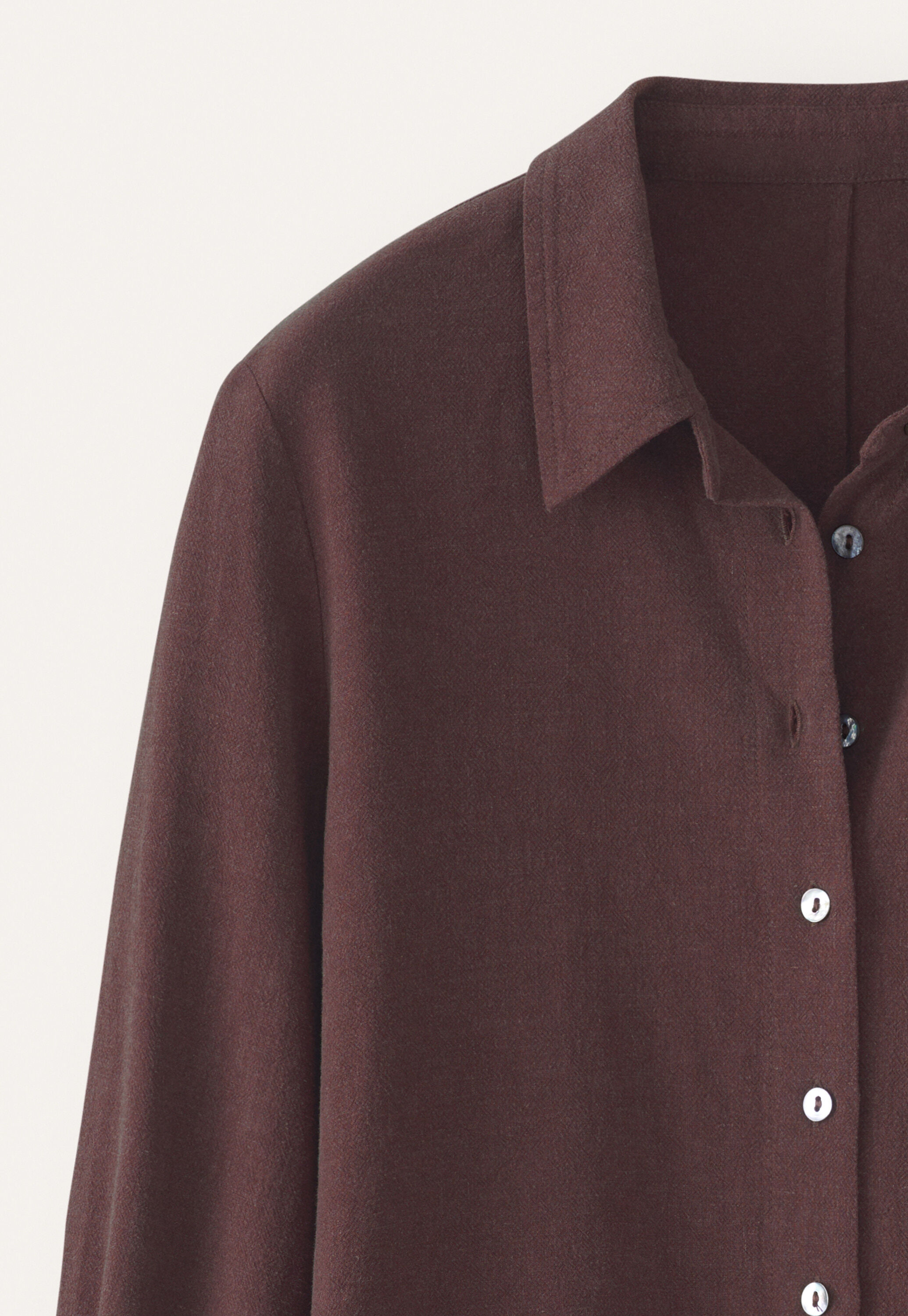 Curved-sleeve blouse