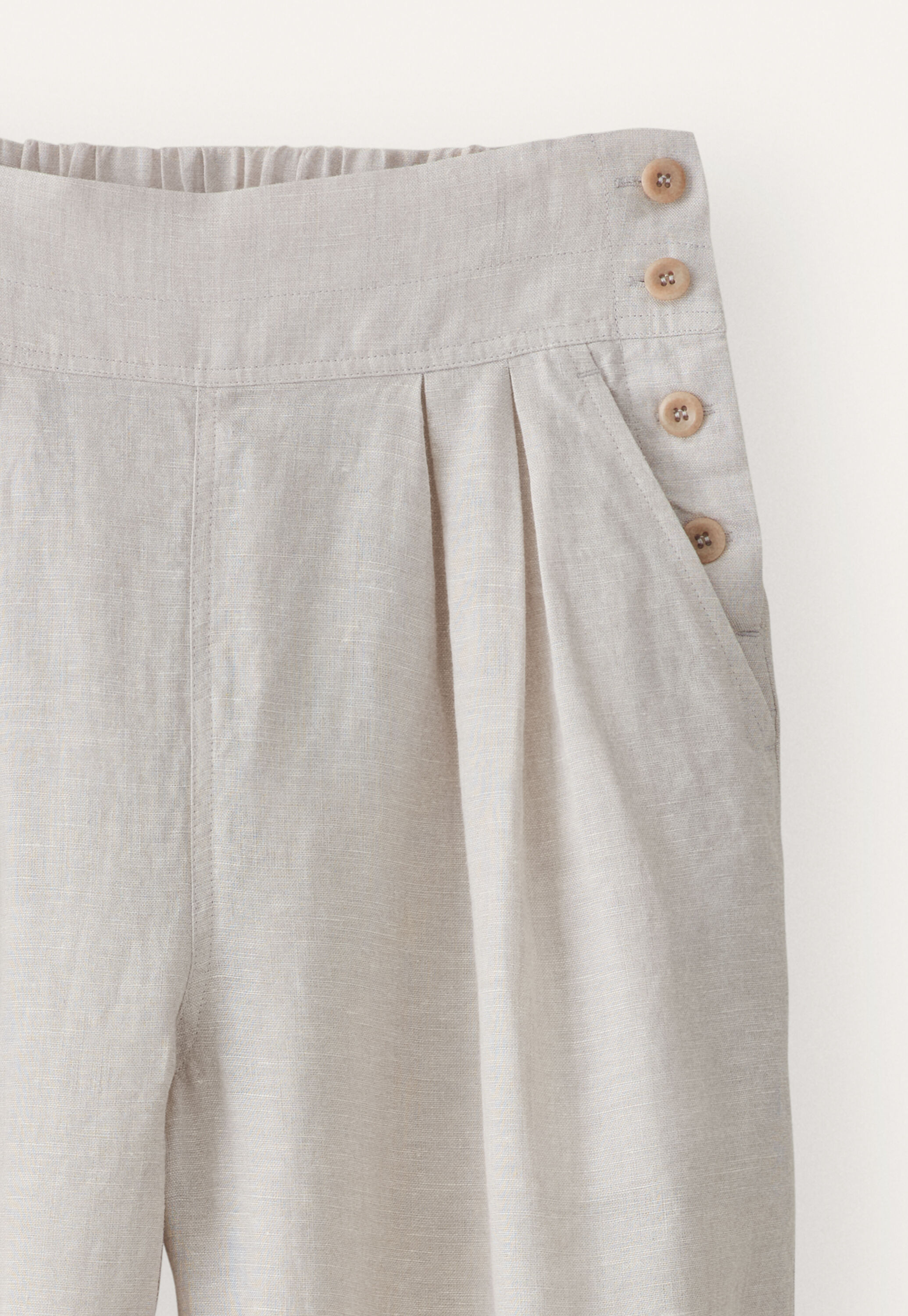 Cropped pleated trousers