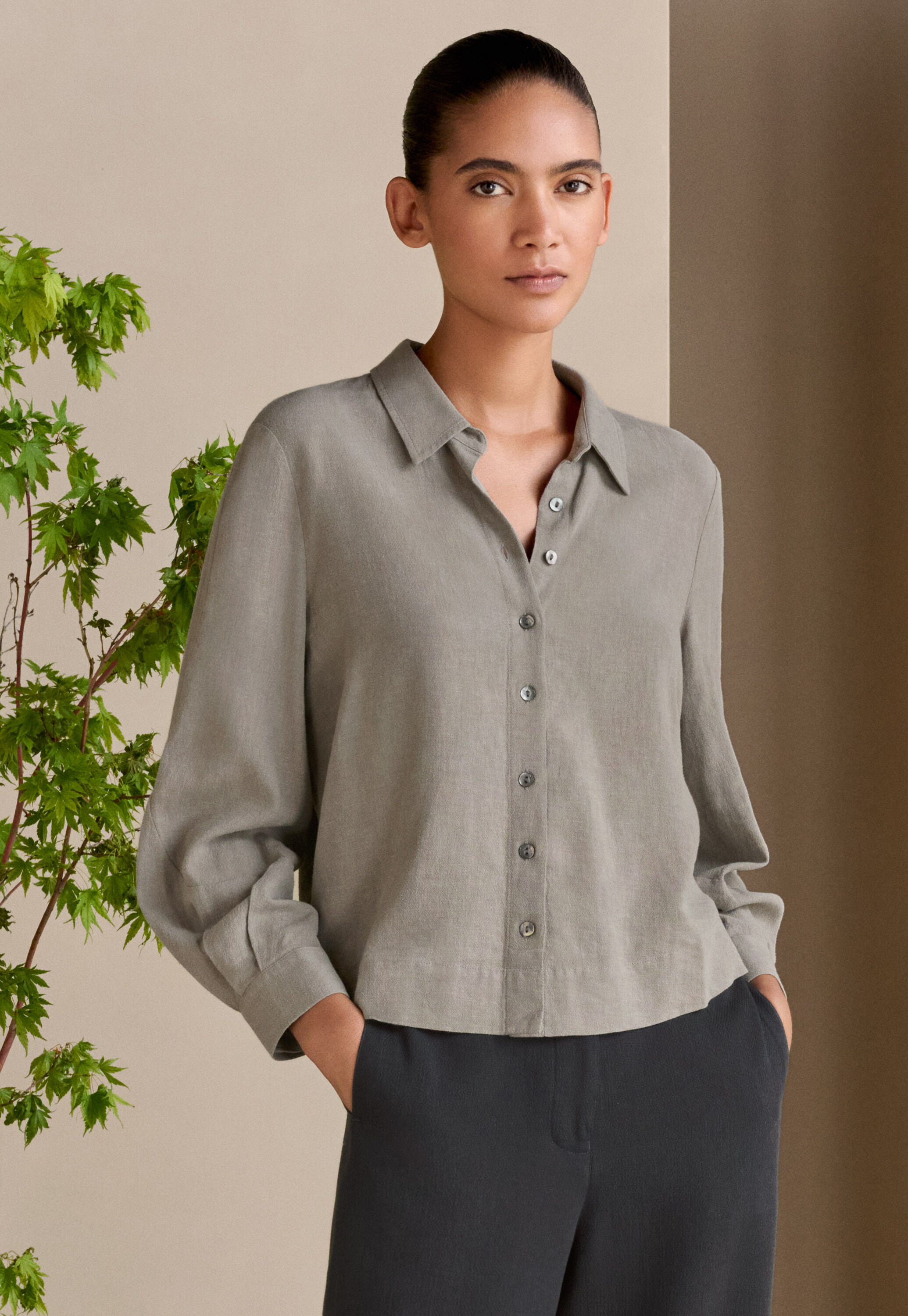 Curved-sleeve blouse