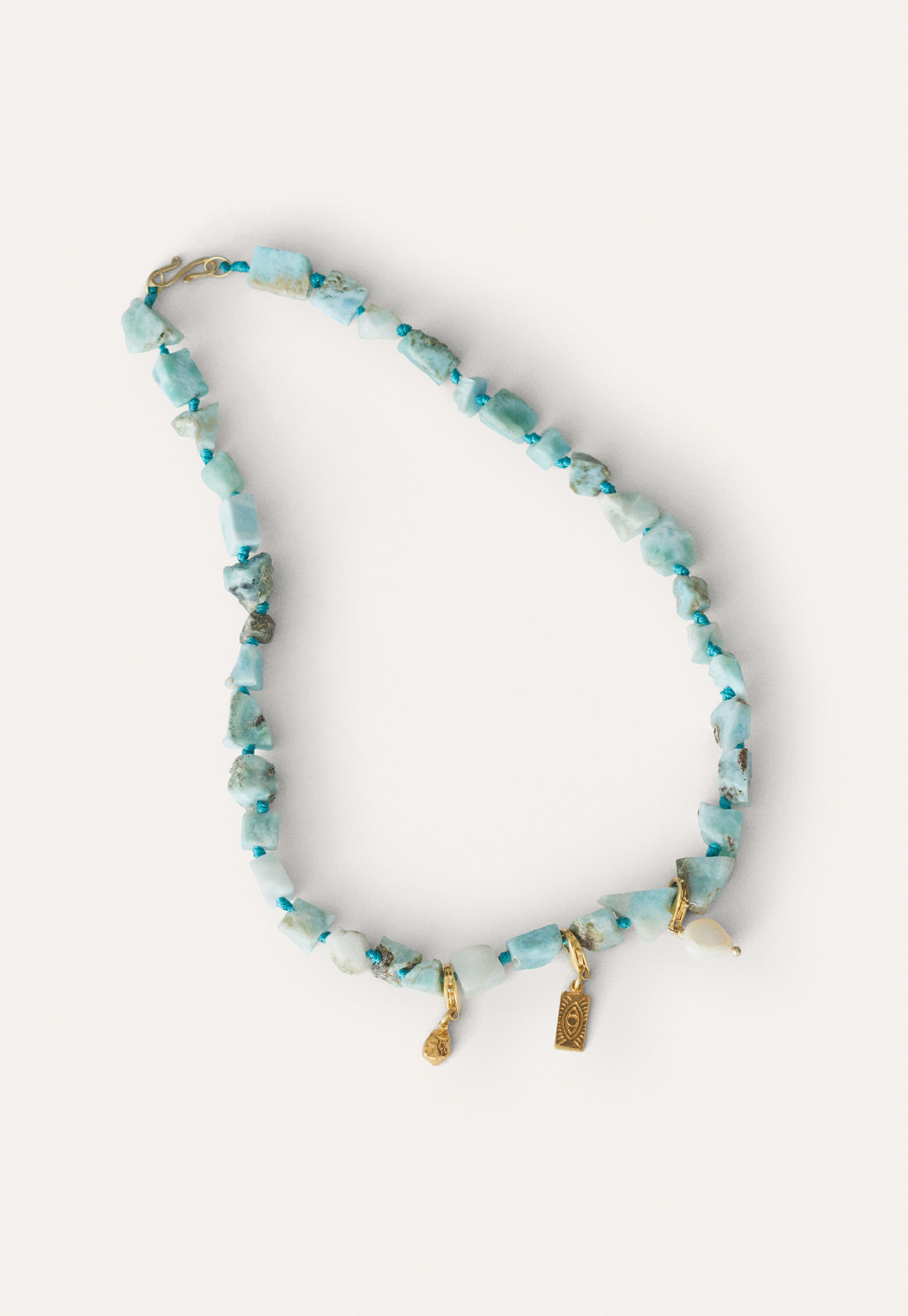 Stone and charm necklace