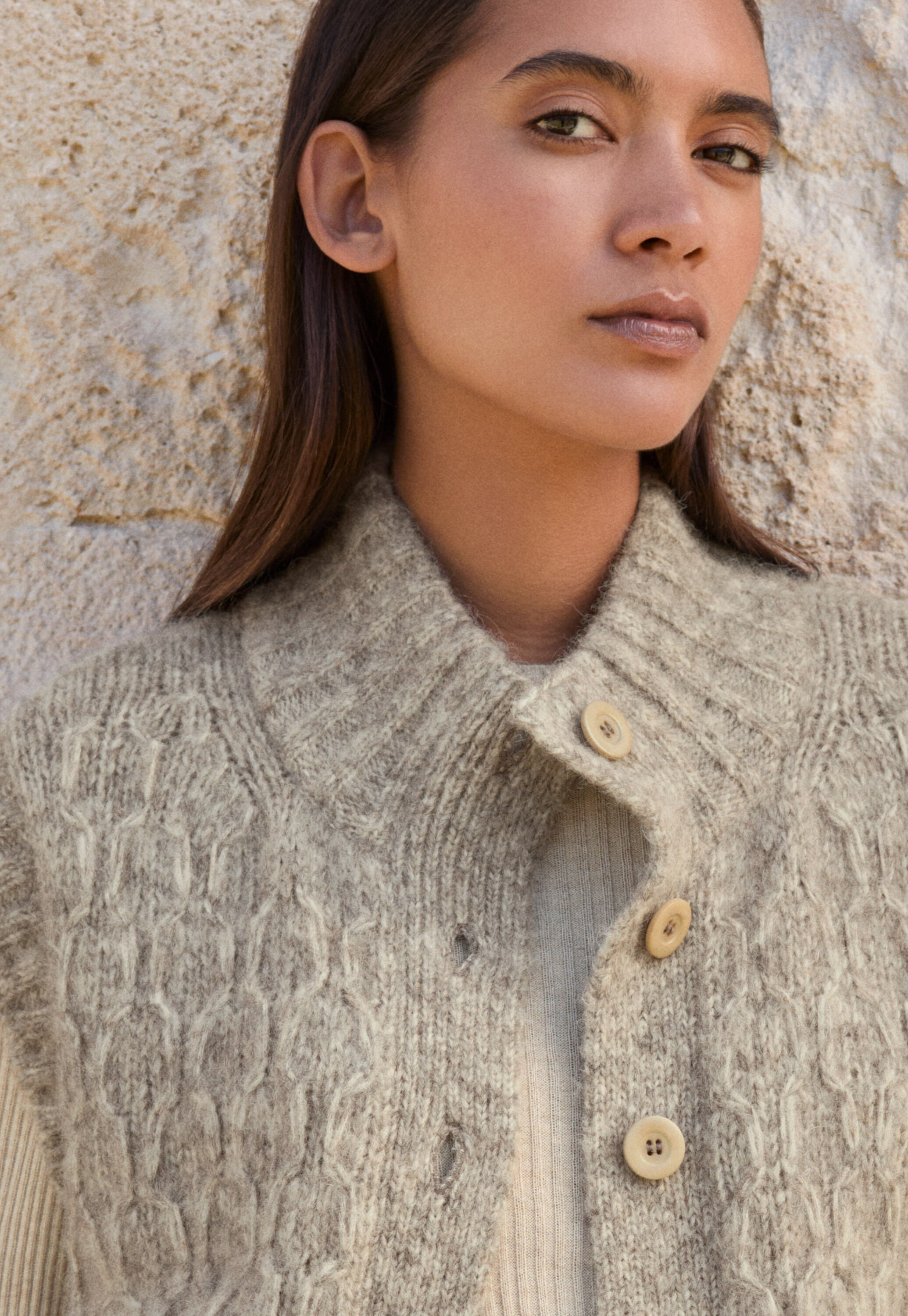 Cable-stitch sleeveless cardigan